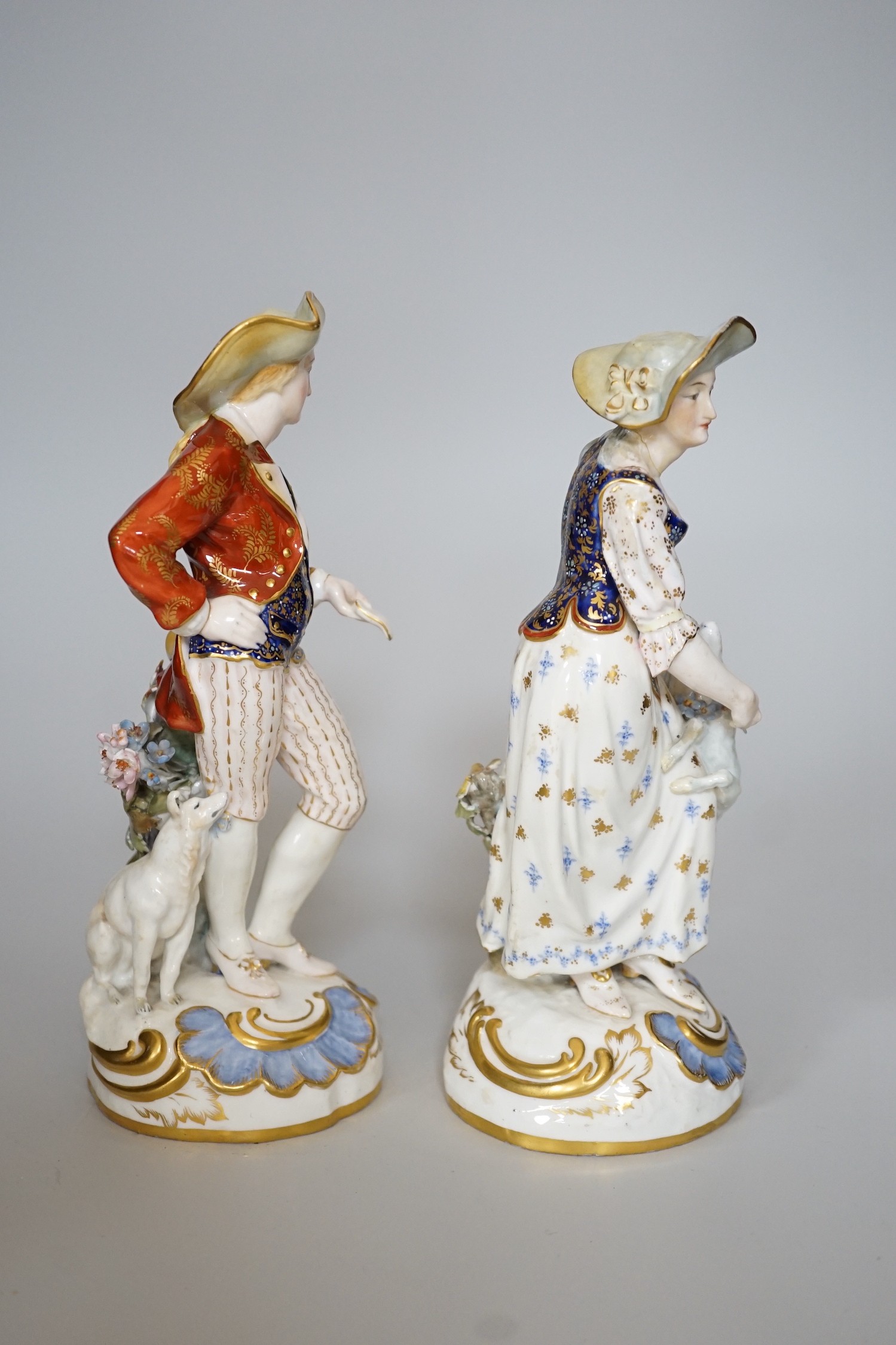 A pair of Royal Crown Derby figures of a Shepherd and shepherdess, 23cm